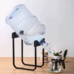 Table top dispenser water holder